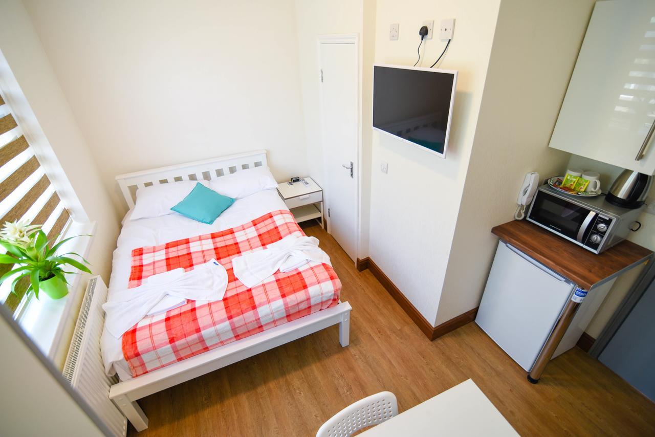 Green Suites London Room photo